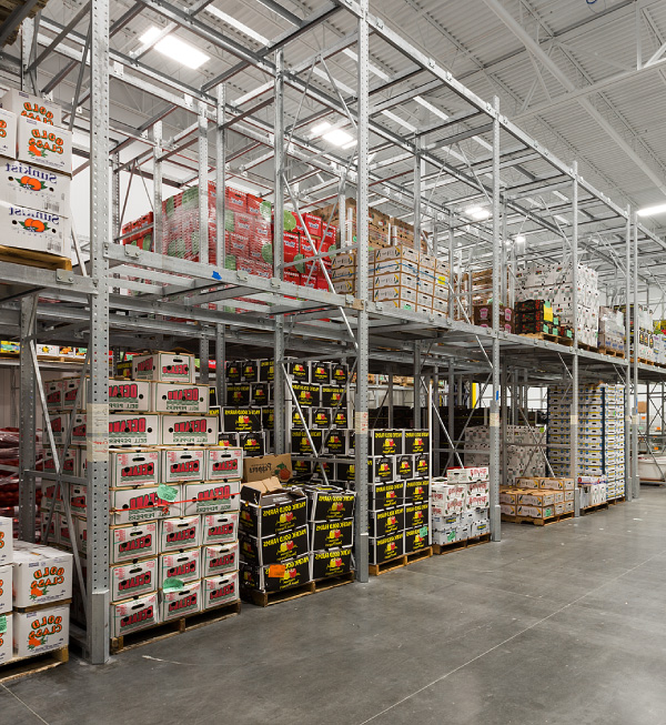 warehouse with produce stacked on shelves