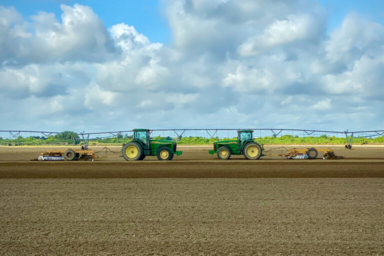 tractors disking fields